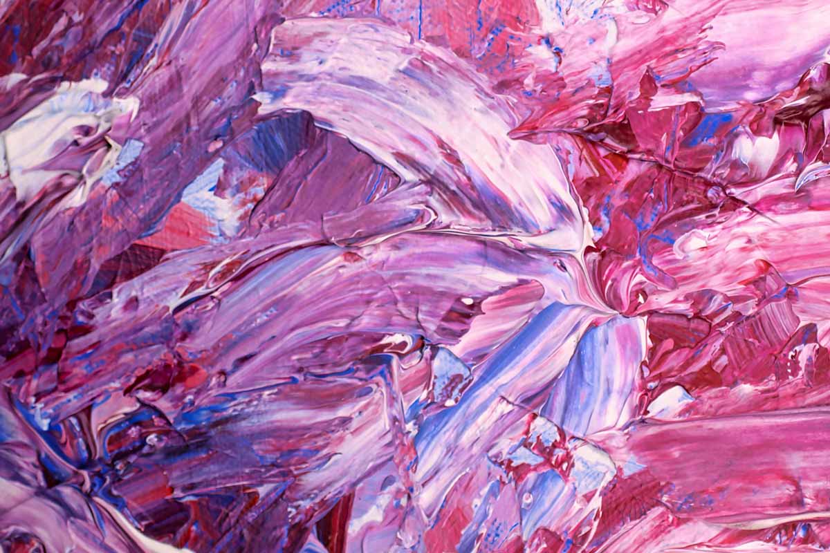 an abstract painting in shades and hues of pink, red, and purple